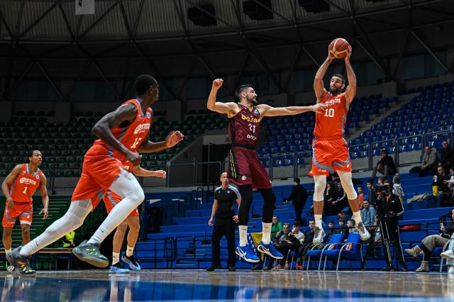(260205) -- ZAGREB, Feb. 5, 2026 (Xinhua) -- Mislav Brzoja (1st R) of Cedevita Junior shoots during the FIBA Europe Cup basketball match between Cedevita Junior and KK Bosna BH Telecom in Zagreb, Croatia, on Feb. 4, 2026. (Photo by Luka Antunac/PIXSELL via Xinhua)