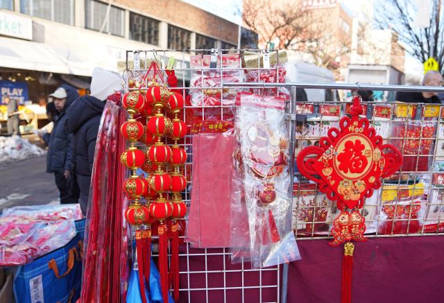 (260205) -- NEW YORK, Feb. 5, 2026 (Xinhua) -- A vendor sells decorations for Chinese Spring Festival in Flushing, New York city, the United States, on Feb. 4, 2026. (Xinhua/Zhang Fengguo)