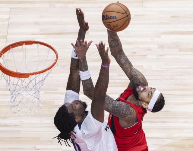 (260205) -- TORONTO, Feb. 5, 2026 (Xinhua) -- Brandon Ingram (R) of Toronto Raptors goes for a layup during the 2025-2026 NBA regular season game between Toronto Raptors and Minnesota Timberwolves in Toronto, Canada, on Feb. 4, 2026. (Photo by Zou Zheng/Xinhua)