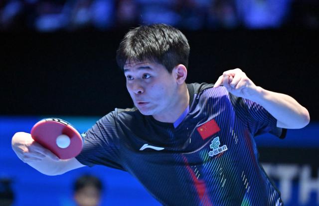(260205) -- HAIKOU, Feb. 5, 2026 (Xinhua) -- Lin Shidong hits a return during the men's singles group match between Lin Shidong of China and Kuo Guan-Hong of Chinese Taipei at the ITTF-ATTU Asian Cup Haikou 2026 table tennis tournament in Haikou, south China's Hainan Province, Feb. 5, 2026. (Xinhua/Guo Cheng)