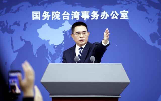 (260205) -- BEIJING, Feb. 5, 2026 (Xinhua) -- Chen Binhua, a spokesperson for the State Council Taiwan Affairs Office, gestures at a press conference in Beijing, capital of China, Feb. 5, 2026. (Xinhua/Pan Xu)