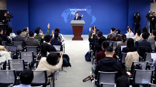(260205) -- BEIJING, Feb. 5, 2026 (Xinhua) -- Chen Binhua, a spokesperson for the State Council Taiwan Affairs Office, gestures at a press conference in Beijing, capital of China, Feb. 5, 2026. (Xinhua/Pan Xu)