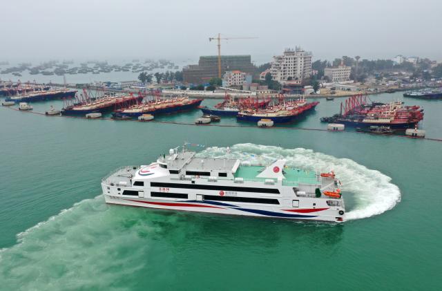 (260205) -- BEIHAI, Feb. 5, 2026 (Xinhua) -- An aerial drone photo shows the Beiyou 36 passenger ship departing from Beihai international port and heading for Weizhou Island in Beihai, south China's Guangxi Zhuang Autonomous Region, Feb. 5, 2026. Beiyou 36, the 1,200-seat high-speed passenger ship newly put into operation in Baihai for the Spring Festival travel rush, has a total length of 71 meters, a designed speed of 29 knots, and a maximum speed of over 32 knots. (Xinhua/Lu Boan)