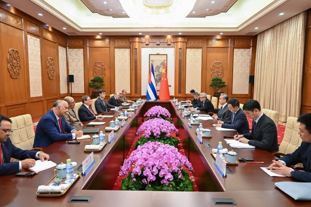 (260205) -- BEIJING, Feb. 5, 2026 (Xinhua) -- Chinese Foreign Minister Wang Yi, also a member of the Political Bureau of the Communist Party of China Central Committee, holds talks with Bruno Rodriguez Parrilla, who is the special envoy of the party and government of Cuba, a member of the Politburo of the Central Committee of the Cuban Communist Party and the foreign minister of Cuba, in Beijing, capital of China, Feb. 5, 2026. (Xinhua/Li Xin)