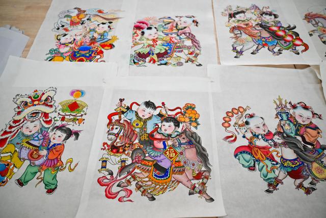 (260205) -- TIANJIN, Feb. 5, 2026 (Xinhua) -- This photo taken on Feb. 4, 2026 shows Chinese New Year paintings themed on horse at Tianjin Yangliuqing Fine Arts Press in Tianjin, north China. In celebration of the upcoming Year of the Horse, Tianjin Yangliuqing Fine Arts Press released a series of horse-themed New Year paintings, integrating traditional New Year painting skills with modern design. (Xinhua/Sun Fanyue)