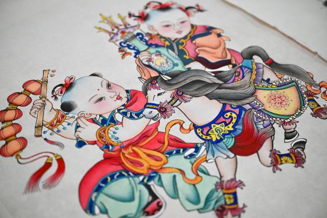 (260205) -- TIANJIN, Feb. 5, 2026 (Xinhua) -- This photo taken on Feb. 4, 2026 shows a horse-themed Chinese New Year painting at Tianjin Yangliuqing Fine Arts Press in Tianjin, north China. In celebration of the upcoming Year of the Horse, Tianjin Yangliuqing Fine Arts Press released a series of horse-themed New Year paintings, integrating traditional New Year painting skills with modern design. (Xinhua/Sun Fanyue)