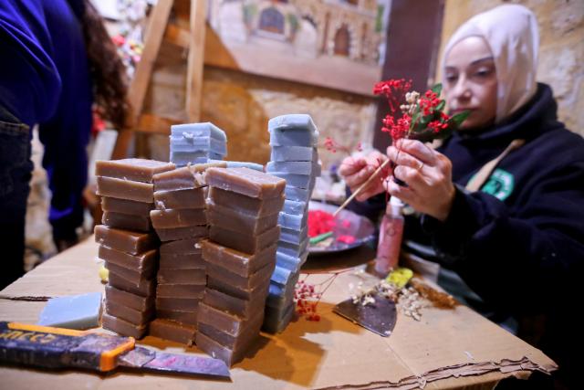 (260205) -- TRIPOLI, Feb. 5, 2026 (Xinhua) -- A woman makes soap flowers at the Soap Museum in Tripoli, northern Lebanon, Feb. 5, 2026. (Photo by Bilal Jawich/Xinhua)