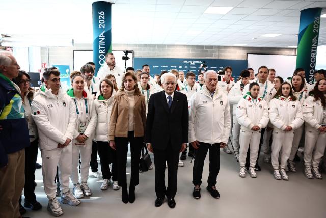 (260205) -- MILAN, Feb. 5, 2026 (Xinhua) -- Italian President Sergio Mattarella and his daughter Laura Mattarella and the President of the Italian National Olympic Committee (CONI) Luciano Buonfiglio visit the Olympic Village ahead of the 2026 Milan-Cortina Winter Olympics in Milan, Italy, Feb. 5, 2026. (Yara Nardi/Pool via Xinhua)