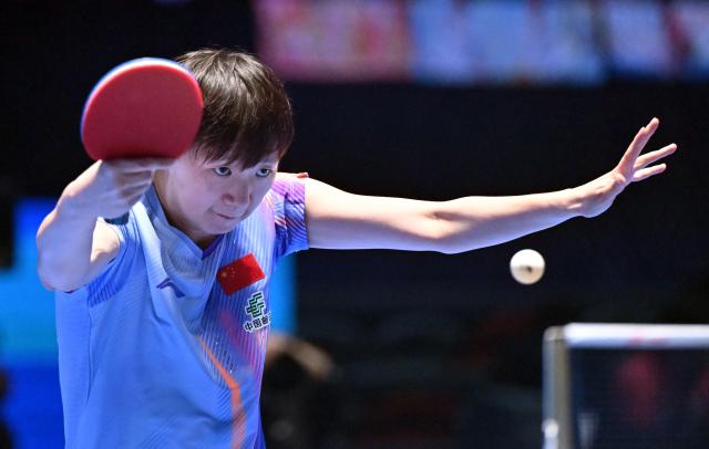 (260205) -- HAIKOU, Feb. 5, 2026 (Xinhua) -- Wang Manyu hits a return during the women's singles group match between Wang Manyu of China and Akae Kaho of Japan at the ITTF-ATTU Asian Cup Haikou 2026 table tennis tournament in Haikou, south China's Hainan Province, Feb. 5, 2026. (Xinhua/Guo Cheng)