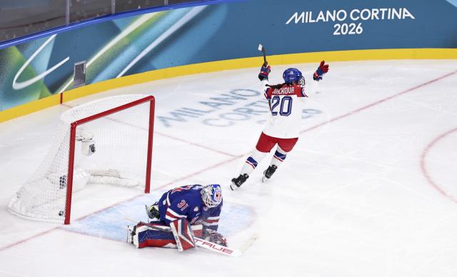 (260205) -- MILAN, Feb. 5, 2026 (Xinhua) -- Barbora Jurickova (Top) of the Czech Republic celebrates after scoring a goal during the ice hockey Women's Preliminary Round Group A match between the United States and the Czech Republic at the Milan-Cortina 2026 Olympic Winter Games in Milan, Italy, Feb. 5, 2026. (Xinhua/Wang Kaiyan)