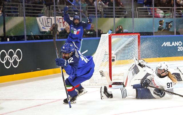 (260205) -- MILAN, Feb. 5, 2026 (Xinhua) -- Rebecca Roccella (1st L) of Italy celebrates scoring during the ice hockey women's preliminary round group B match between Italy and France of the Milan-Cortina 2026 Olympic Winter Games in Milan, Italy, Feb. 5, 2026. (Xinhua/Zhang Haofu)