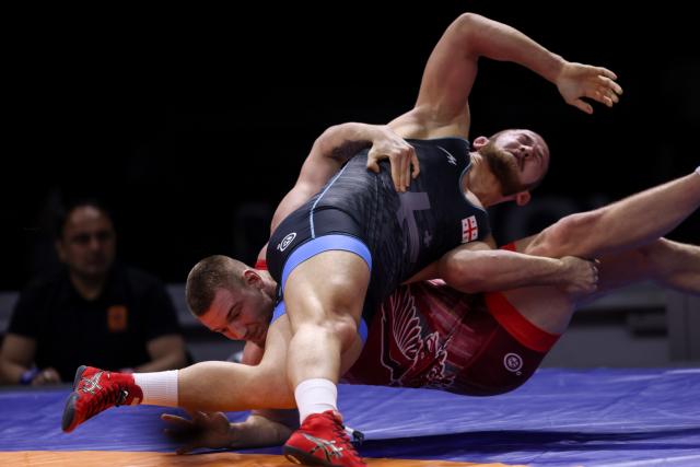 (260206) -- ZAGREB, Feb. 6, 2026 (Xinhua) -- Richard Vegh (below) of Hungary competes against Andro Margishvili of Georgia during UWW Grand Prix Ranking Series Zagreb Open 2026 Men's Freestyle 97kg weight class bronze medal match in Zagreb, Croatia, on Feb. 5, 2026 . (Photo by Igor Kralj/PIXSELL via Xinhua)