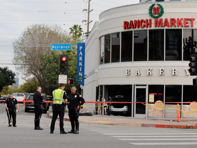 (260206) -- LOS ANGELES, Feb. 6, 2026 (Xinhua) -- Police officers are seen at the accident site after a vehicle crashed into the 99 Ranch Market in the Westwood neighborhood in Los Angeles, California, the United States, on Feb. 5, 2026. At least three people were killed and multiple others injured after a vehicle crashed into a grocery store in the Westwood neighborhood in the U.S. city of Los Angeles on Thursday, according to local authorities.
   The crash was reported around noon. Three people were pronounced dead at the scene, and seven others were transported to a local hospital, the Los Angeles Fire Department said.
   Local media identified the grocery store as a 99 Ranch Market, an Asian supermarket chain. (Photo by Qiu Chen/Xinhua)