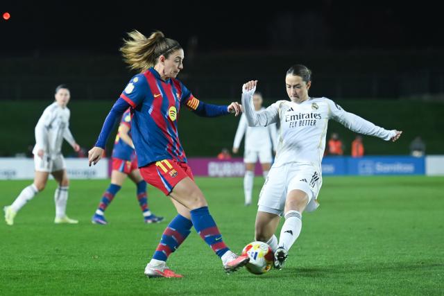(260206) -- MADRID, Feb. 6, 2026 (Xinhua) -- Sara Dabritz (R) of Real Madrid vies with Alexia Putellas of Barcelona during the Copa de la Reina match between Real Madrid and FC Barcelona in Madrid, Spain, on Feb. 5, 2026. (Photo by Gustavo Valiente/Xinhua)