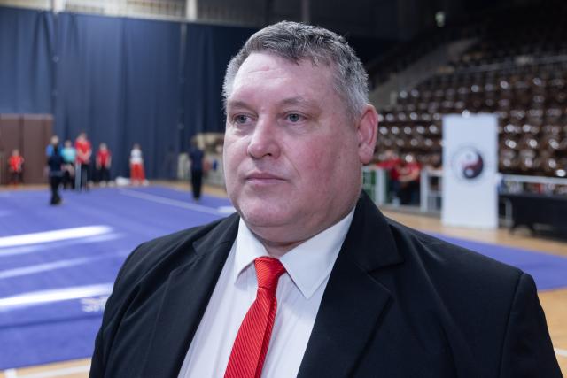 (260206) -- BUDAPEST, Feb. 6, 2026 (Xinhua) -- Istvan Varga, president of the Hungarian Wushu Federation, is interviewed during the European Wushu Taolu training camp in Budapest, Hungary, on Feb. 5, 2026. TO GO WITH "Europe launches first high-level wushu taolu camp ahead of Youth Olympics" (Photo by Attila Volgyi/Xinhua)