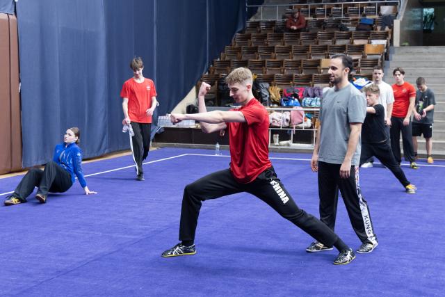 (260206) -- BUDAPEST, Feb. 6, 2026 (Xinhua) -- Junior athletes practice during the European Wushu Taolu training camp in Budapest, Hungary, on Feb. 5, 2026. TO GO WITH "Europe launches first high-level wushu taolu camp ahead of Youth Olympics" (Photo by Attila Volgyi/Xinhua)