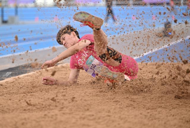 (260206) -- TIANJIN, Feb. 6, 2026 (Xinhua) -- China's Jiao Xinping competes during the men's triple jump final at the 12th Asian Indoor Athletics Championships 2026 in Tianjin, north China, Feb. 6, 2026. (Xinhua/Li Ran)