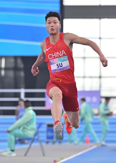 (260206) -- TIANJIN, Feb. 6, 2026 (Xinhua) -- China's Su Wen competes during the men's triple jump final at the 12th Asian Indoor Athletics Championships 2026 in Tianjin, north China, Feb. 6, 2026. (Xinhua/Li Ran)