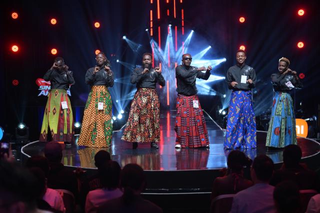 (260206) -- NAIROBI, Feb. 6, 2026 (Xinhua) -- Singers perform during the finals of Sing for Africa, a Chinese-supported musical talent show in Nairobi, Kenya, Dec. 29, 2025.
  Fanuel Mulwa was over the moon after outperforming dozens of contestants to win Sing for Africa, a Chinese-supported musical talent show launched in Nairobi, Kenya's capital, in November 2025.
   The artist competed in every episode of the contest, impressing judges with his smooth vocals, confidence, and commanding stage presence.
   "The experience was good, and the artists were highly competitive. During the auditions, I performed a song called Kwaheri -- the Swahili word for goodbye -- as a way of moving on from a previous heartbreak," Mulwa told Xinhua ahead of the finals.
   Meeting local music legends during auditions at a studio in Nairobi was uplifting, he said, adding that encouragement from judges pushed him to refine his craft and aim for victory in a contest that captivated audiences in Kenya and beyond.
   Mulwa said the experience sharpened his songwriting skills, and he plans to use the prize money of one million Kenyan shillings (about 7,700 U.S. dollars) to set up a studio to nurture the next generation of musical talent in the country.
    TO GO WITH "Feature: Chinese-backed musical talent show unlocks creative genius of Kenyan youth" (Xinhua/Yang Guang)