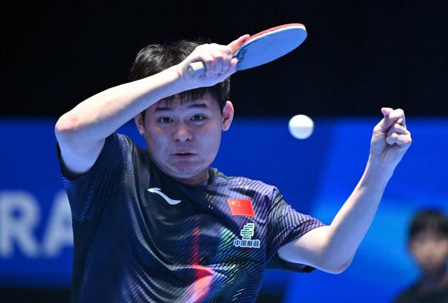 (260206) -- HAIKOU, Feb. 6, 2026 (Xinhua) -- Lin Shidong hits a return during the men's singles group match between Lin Shidong of China and Abdulaziz Bu Shulaybi of Saudi Arabia at the ITTF-ATTU Asian Cup Haikou 2026 table tennis tournament in Haikou, south China's Hainan Province, Feb. 6, 2026. (Xinhua/Guo Cheng)