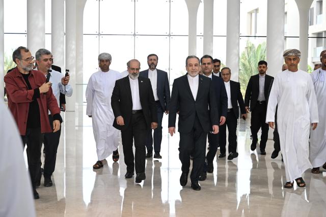 (260206) -- MUSCAT, Feb. 6, 2026 (Xinhua) -- Iranian Foreign Minister Seyed Abbas Araghchi (C, front) and his accompanying delegation depart for the site of the bilateral talks in Muscat, Oman, Feb. 6, 2026.
  Delegations from the United States and Iran on Friday began talks in the Omani capital of Muscat, marking a renewed diplomatic effort amid heightened regional tensions. (Xinhua)