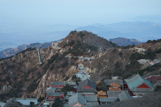 (260206) -- JINAN, Feb. 6, 2026 (Xinhua) -- Tourists visit Mount Tai in Tai'an, east China's Shandong Province, Feb. 6, 2026. (Xinhua/Zhu Zheng)