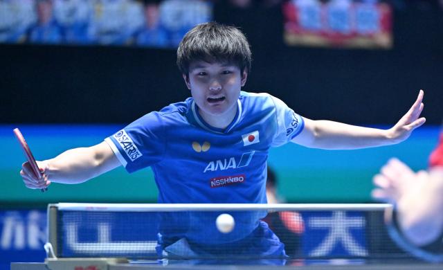 (260206) -- HAIKOU, Feb. 6, 2026 (Xinhua) -- Harimoto Tomokazu hits a return during the men's singles group 3 match between Harimoto Tomokazu of Japan and Aidos Kenzhigulov of Kazakhstan at the ITTF-ATTU Asian Cup Haikou 2026 table tennis tournament in Haikou, south China's Hainan Province, Feb. 6, 2026. (Xinhua/Guo Cheng)