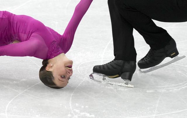(260206) -- MILAN, Feb. 6, 2026 (Xinhua) -- Ioulia Chtchetinina (L)/Michal Wozniak of Poland compete during the figure skating team event pair skating short program of the Milan-Cortina 2026 Olympic Winter Games in Milan, Italy, Feb. 6, 2026. (Xinhua/Xue Yuge)