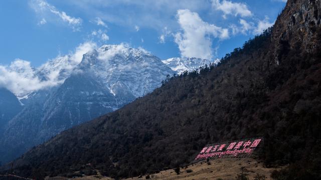 (260206) -- SHANNAN, Feb. 6, 2026 (Xinhua) -- This photo taken on Feb. 5, 2026 shows a view of Yumai Town, Lhunze County in Shannan City, southwest China's Xizang Autonomous Region. Yumai Town, located on the southern foot of the Himalayas, was once home to merely three permanent residents due to its harsh and rugged terrain. Today, residential houses here are neatly arranged, with comprehensive infrastructure including drainage and communication facilities in place. 
   Schools, health clinics, and hotels have also been established, alongside with home-stays, small shops, and courier stations operated by villagers.
   In 2025, the area received over 12,000 tourists, with home-stay income exceeding 284,200 yuan. (Xinhua/Tenzin Nyida)