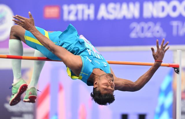 (260206) -- TIANJIN, Feb. 6, 2026 (Xinhua) -- Jothi Shankar Aadarsh Ram of India competes during the men's high jump final at the 12th Asian Indoor Athletics Championships 2026 in Tianjin, north China, Feb. 6, 2026. (Xinhua/Li Ran)