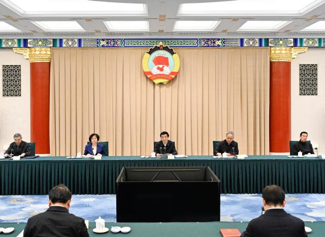 (260206) -- BEIJING, Feb. 6, 2026 (Xinhua) -- Wang Huning, a member of the Standing Committee of the Political Bureau of the Communist Party of China (CPC) Central Committee and chairman of the Chinese People's Political Consultative Conference (CPPCC) National Committee, presides over the 46th Chairperson's Council meeting of the 14th CPPCC National Committee and delivers remarks, in Beijing, capital of China, Feb. 6, 2026. (Xinhua/Shen Hong)