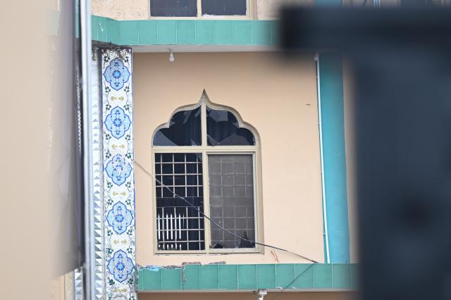(260206) -- ISLAMABAD, Feb. 6, 2026 (Xinhua) -- A broken window is seen in a mosque where an explosion took place in Islamabad, capital of Pakistan, on Feb. 6, 2026. At least 31 people were killed and around 170 others were injured after an explosion ripped through a mosque during Friday prayers in Pakistan's federal capital city of Islamabad, police and government officials said. (Xinhua/Ahmad Kamal)