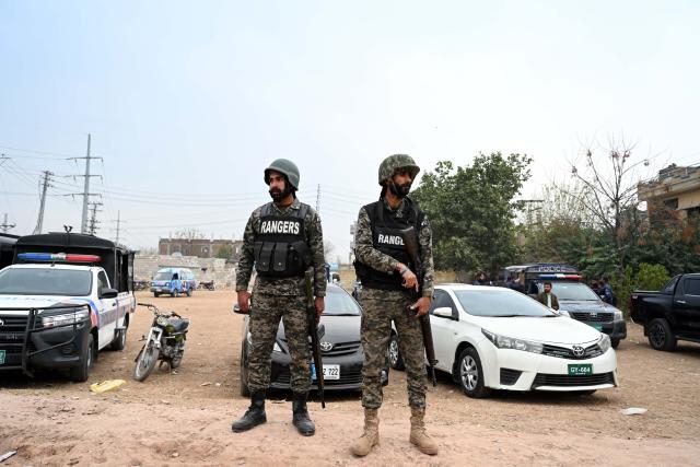 (260206) -- ISLAMABAD, Feb. 6, 2026 (Xinhua) -- Security personnel stand guard outside a mosque where an explosion took place in Islamabad, capital of Pakistan, on Feb. 6, 2026. At least 31 people were killed and around 170 others were injured after an explosion ripped through a mosque during Friday prayers in Pakistan's federal capital city of Islamabad, police and government officials said. (Xinhua/Ahmad Kamal)
