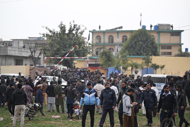 (260206) -- ISLAMABAD, Feb. 6, 2026 (Xinhua) -- People gather outside a mosque where an explosion took place in Islamabad, capital of Pakistan, on Feb. 6, 2026. At least 31 people were killed and around 170 others were injured after an explosion ripped through a mosque during Friday prayers in Pakistan's federal capital city of Islamabad, police and government officials said. (Xinhua/Ahmad Kamal)