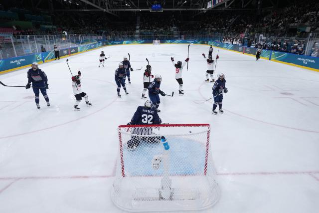 (260206) -- MILAN, Feb. 6, 2026 (Xinhua) -- Players of Japan celebrate a goal during the Women's Preliminary Round Group B match between France and Japan of Ice Hockey of the 2026 Milan-Cortina Olympic Winter Games in Milan, Italy, Feb. 6, 2026. (Zhang Cheng/Pool via Xinhua)