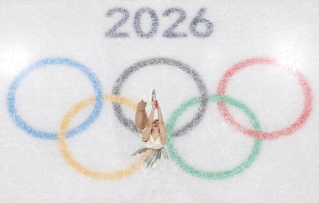 (260206) -- MILAN, Feb. 6, 2026 (Xinhua) -- Alysa Liu of the United States competes during the women single skating short program of the figure skating team event of the Milan-Cortina 2026 Olympic Winter Games in Milan, Italy, Feb. 6, 2026. (Xinhua/Li Ming)