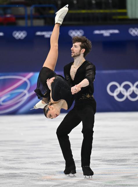 (260206) -- MILAN, Feb. 6, 2026 (Xinhua) -- Sara Conti (L)/Niccolo Macii of Italy compete during the figure skating team event pair skating short program of the Milan-Cortina 2026 Olympic Winter Games in Milan, Italy, Feb. 6, 2026. (Xinhua/Cheng Min)