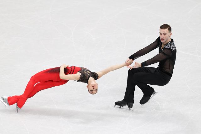 (260206) -- MILAN, Feb. 6, 2026 (Xinhua) -- Anastasiia Metelkina (L)/Luka Berulava of Georgia compete during the figure skating team event pair skating short program of the Milan-Cortina 2026 Olympic Winter Games in Milan, Italy, Feb. 6, 2026. (Xinhua/Chen Yichen)