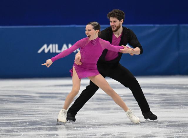 (260206) -- MILAN, Feb. 6, 2026 (Xinhua) -- Ioulia Chtchetinina (L)/Michal Wozniak of Poland compete during the figure skating team event pair skating short program of the Milan-Cortina 2026 Olympic Winter Games in Milan, Italy, Feb. 6, 2026. (Xinhua/Cheng Min)