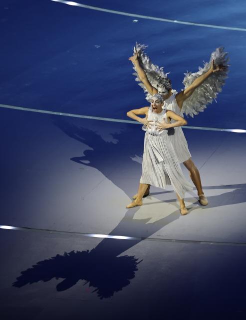 (260206) -- MILAN, Feb. 6, 2026 (Xinhua) -- A duet on the myth of Cupid and Psyche is staged during the opening ceremony of the Milan-Cortina 2026 Olympic Winter Games at the San Siro Olympic Stadium in Milan, Italy, Feb. 6, 2026. (Xinhua/Wang Kaiyan)