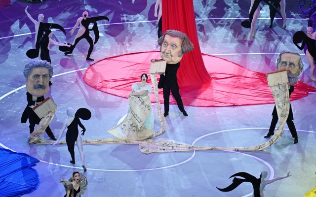 (260206) -- MILAN, Feb. 6, 2026 (Xinhua) -- Artists perform during the opening ceremony of the Milan-Cortina 2026 Olympic Winter Games at the San Siro Olympic Stadium in Milan, Italy, Feb. 6, 2026. (Xinhua/Cheng Min)