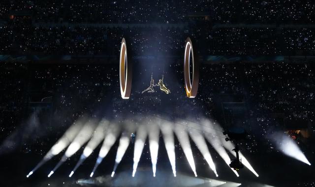 (260206) -- MILAN, Feb. 6, 2026 (Xinhua) -- Artists perform during the opening ceremony of the Milan-Cortina 2026 Olympic Winter Games at the San Siro Olympic Stadium in Milan, Italy, Feb. 6, 2026. (Xinhua/Lai Xiangdong)