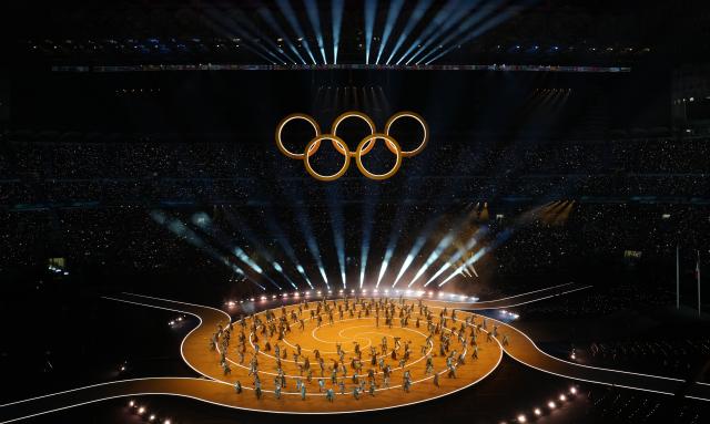 (260206) -- MILAN, Feb. 6, 2026 (Xinhua) -- This photo taken on Feb. 6, 2026 shows the Olympic rings at the opening ceremony of the Milan-Cortina 2026 Olympic Winter Games at the San Siro Olympic Stadium in Milan, Italy. (Xinhua/Cheng Min)