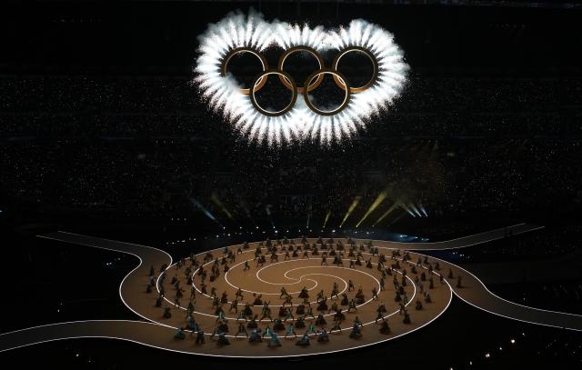 (260206) -- MILAN, Feb. 6, 2026 (Xinhua) -- This photo taken on Feb. 6, 2026 shows the Olympic rings at the opening ceremony of the Milan-Cortina 2026 Olympic Winter Games at the San Siro Olympic Stadium in Milan, Italy. (Xinhua/Cheng Min)