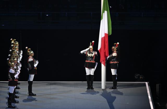(260206) -- MILAN, Feb. 6, 2026 (Xinhua) -- A flag-raising ceremony is held during the opening ceremony of the Milan-Cortina 2026 Olympic Winter Games at the San Siro Olympic Stadium in Milan, Italy, Feb. 6, 2026. (Xinhua/Zhang Haofu)