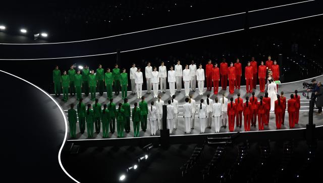 (260206) -- MILAN, Feb. 6, 2026 (Xinhua) -- The Italian national flag is carried to the opening ceremony of the Milan-Cortina 2026 Olympic Winter Games at the San Siro Olympic Stadium in Milan, Italy, Feb. 6, 2026. (Xinhua/Wang Kaiyan)