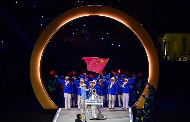 (260206) -- MILAN, Feb. 6, 2026 (Xinhua) -- The delegation of China parades into the San Siro Olympic Stadium during the opening ceremony of the Milan-Cortina 2026 Olympic Winter Games in Milan, Italy, Feb. 6, 2026. (Xinhua/Tao Xiyin)