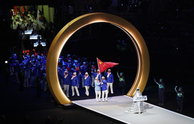 (260206) -- MILAN, Feb. 6, 2026 (Xinhua) -- The delegation of China parades into the San Siro Olympic Stadium during the opening ceremony of the Milan-Cortina 2026 Olympic Winter Games in Milan, Italy, Feb. 6, 2026. (Xinhua/Wang Kaiyan)