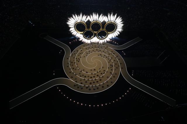 (260206) -- MILAN, Feb. 6, 2026 (Xinhua) -- This photo taken on Feb. 6, 2026 shows the Olympic rings at the opening ceremony of the Milan-Cortina 2026 Olympic Winter Games at the San Siro Olympic Stadium in Milan, Italy. (Xinhua/Chen Yichen)