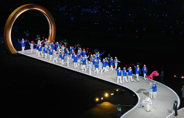 (260206) -- MILAN, Feb. 6, 2026 (Xinhua) -- The delegation of China parades into the San Siro Olympic Stadium during the opening ceremony of the Milan-Cortina 2026 Olympic Winter Games in Milan, Italy, Feb. 6, 2026. (Xinhua/Xue Yuge)